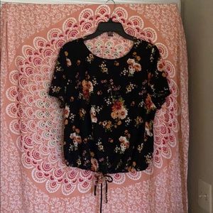 Short sleeve waist length floral top